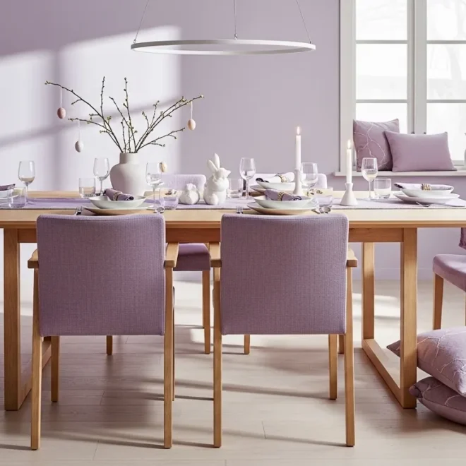 Minimalist Scandinavian dining room featuring soft pastel purple walls and light wood furniture
